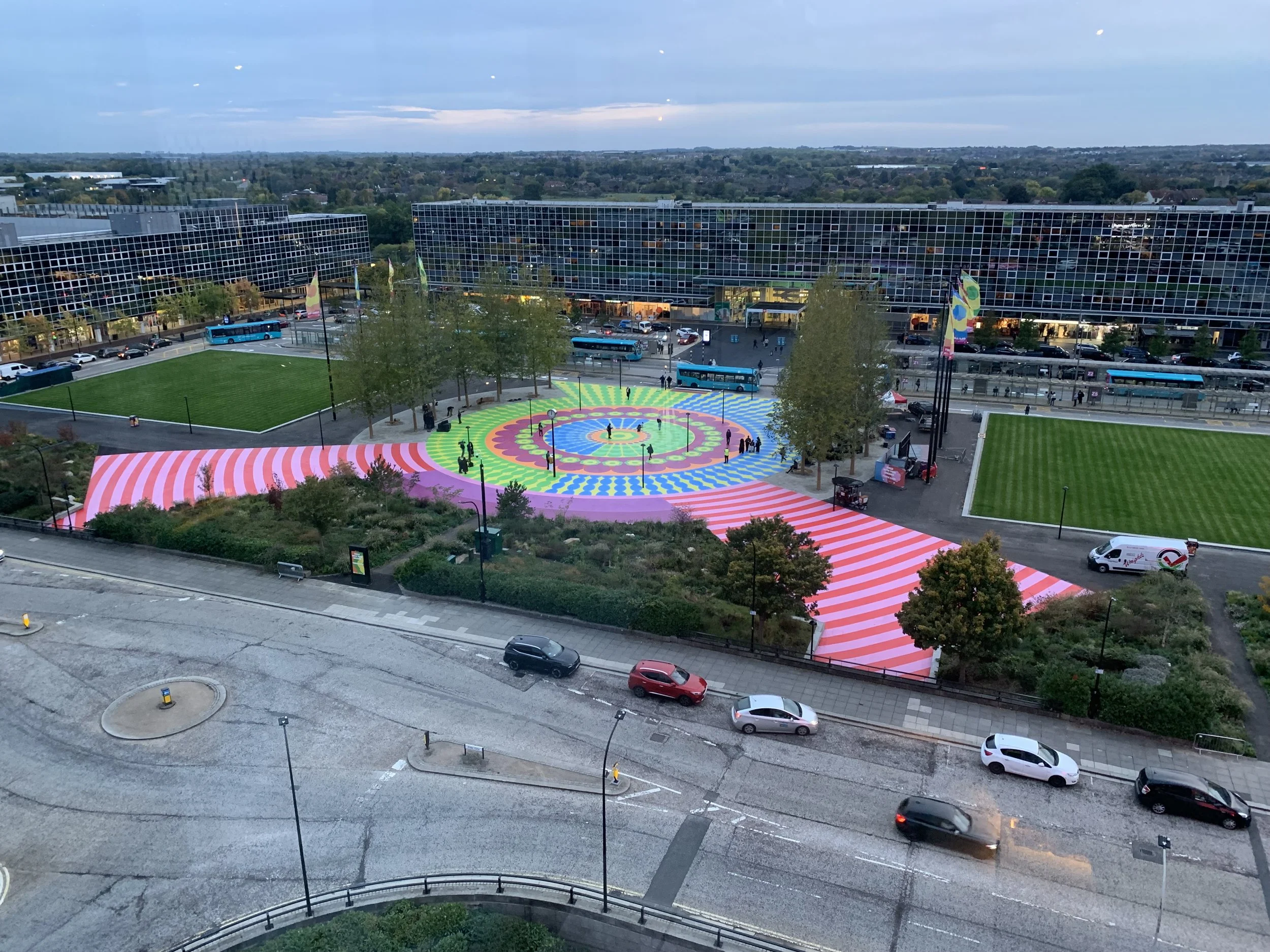   “WALK WITH YOUR DREAMS”   Largest floor mural in the UK. Painted over 6 weeks in Milton Keynes Station Square with London Mural Company using a design created by Yinka Ilori Studio.   Milton Keynes October 2025.  