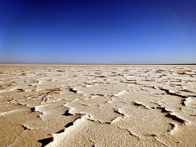 The stark, flat and unforgiving expanse of blinding salt-lakes surrounded by sand hills are what define the Central and Western deserts. The Anangu&nbsp;people have lived and managed this country for thousands upon thousands of years. 
It also happen