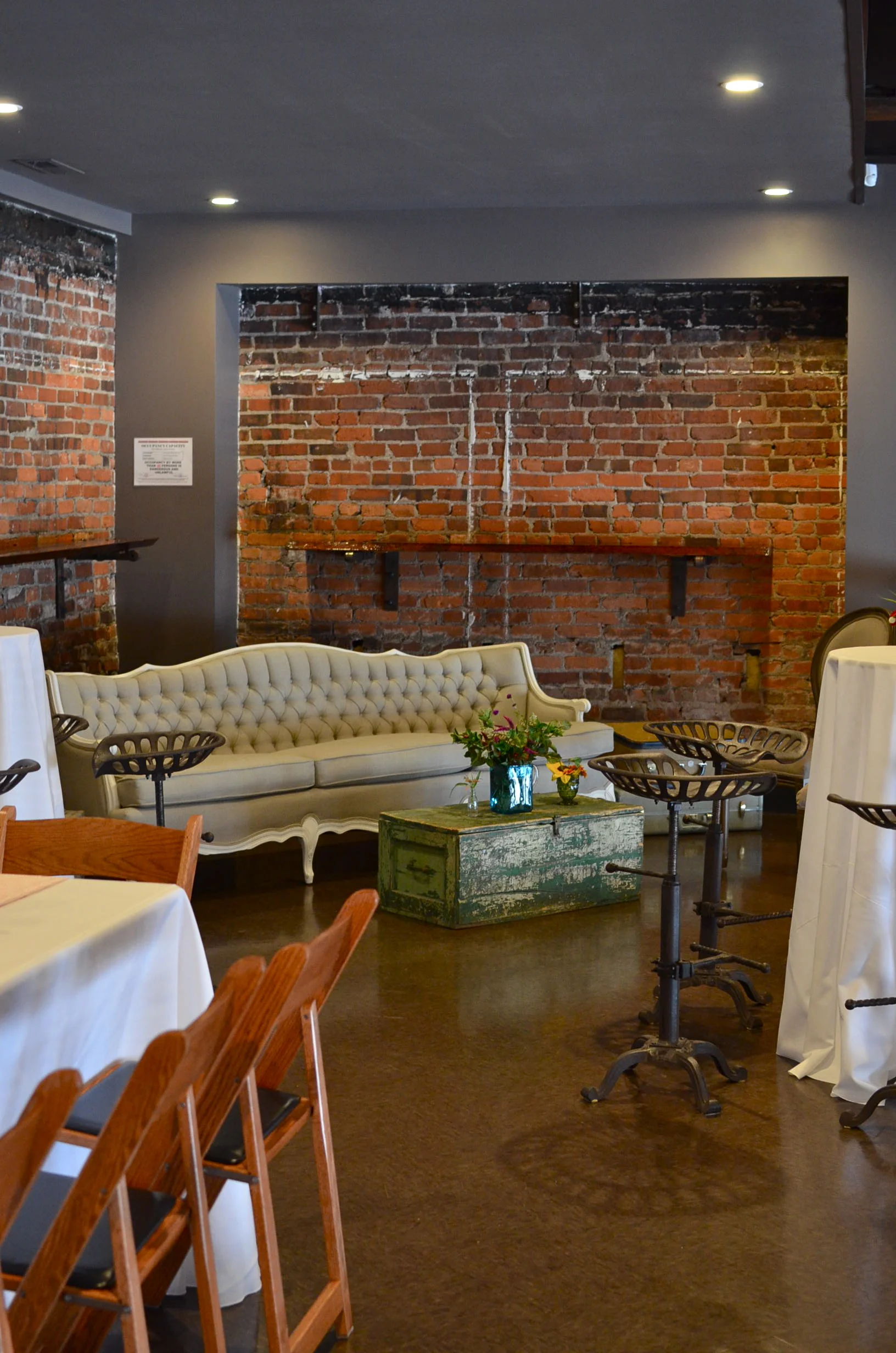 Vintage furniture rentals create a creative lounge area