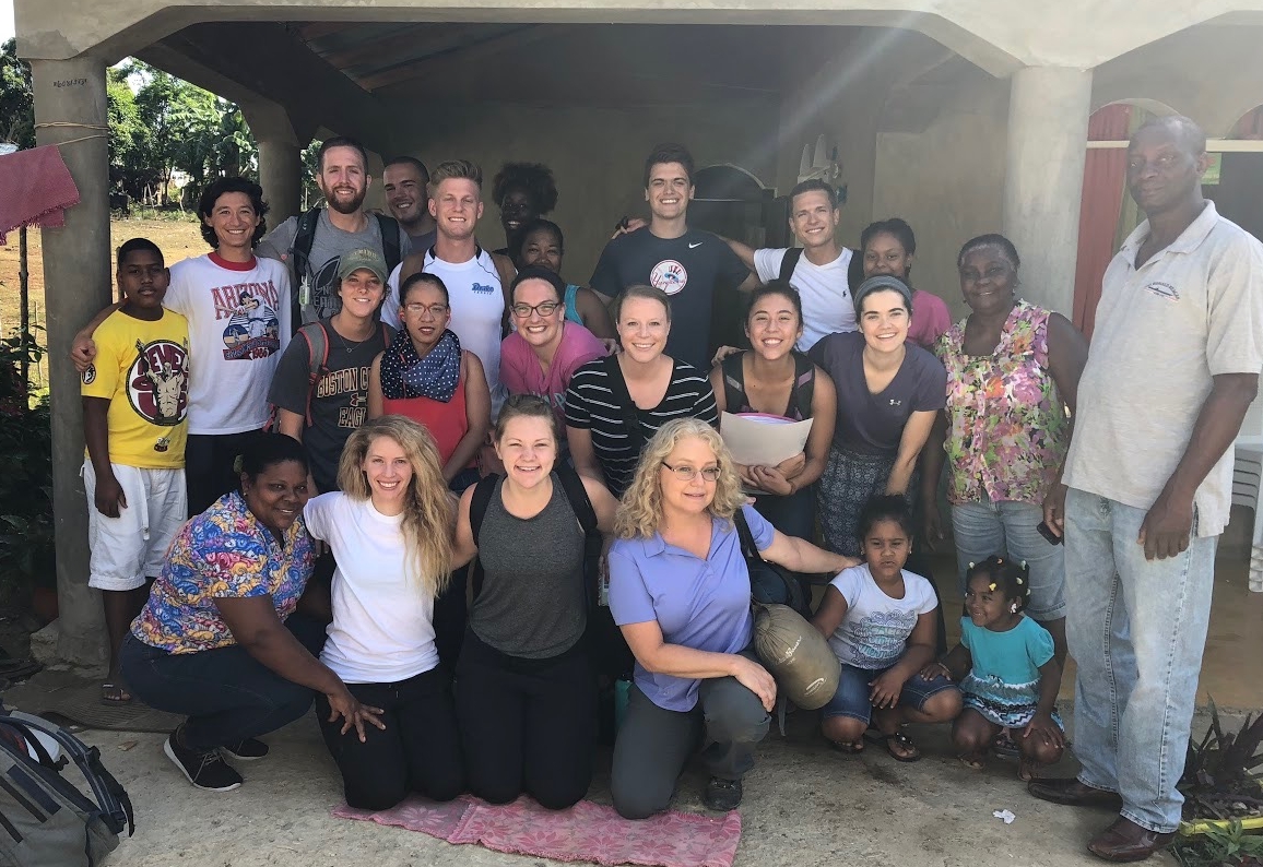 Drs Pastore, Hawkins, and Carlson with friends in the Dominican Republic