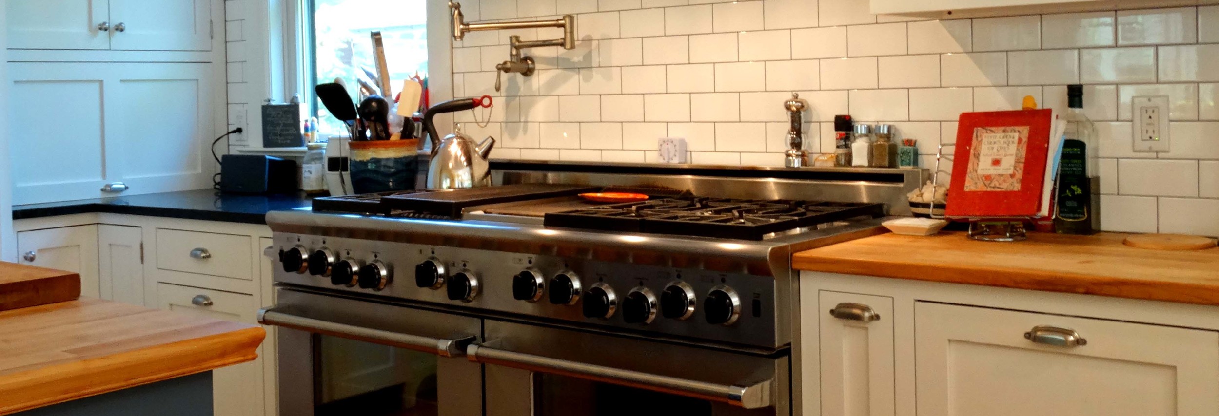 Imagine the kitchen of your dreams with counter and cabinet space to accommodate even the most industrious home chef's necessities, complete with a centerpiece prep cabinet to swoon over.