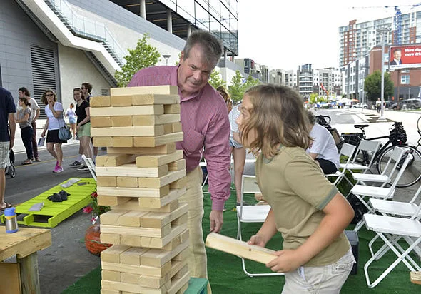Open Streets Nashville encouraged spontaneous physical activity of all kinds, including games of giant Jenga with Mayor Karl Dean! (Photo courtesy of Metro Nashville)