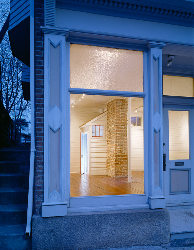 Exterior view of 1870s carriage house, converted to a storefront.
