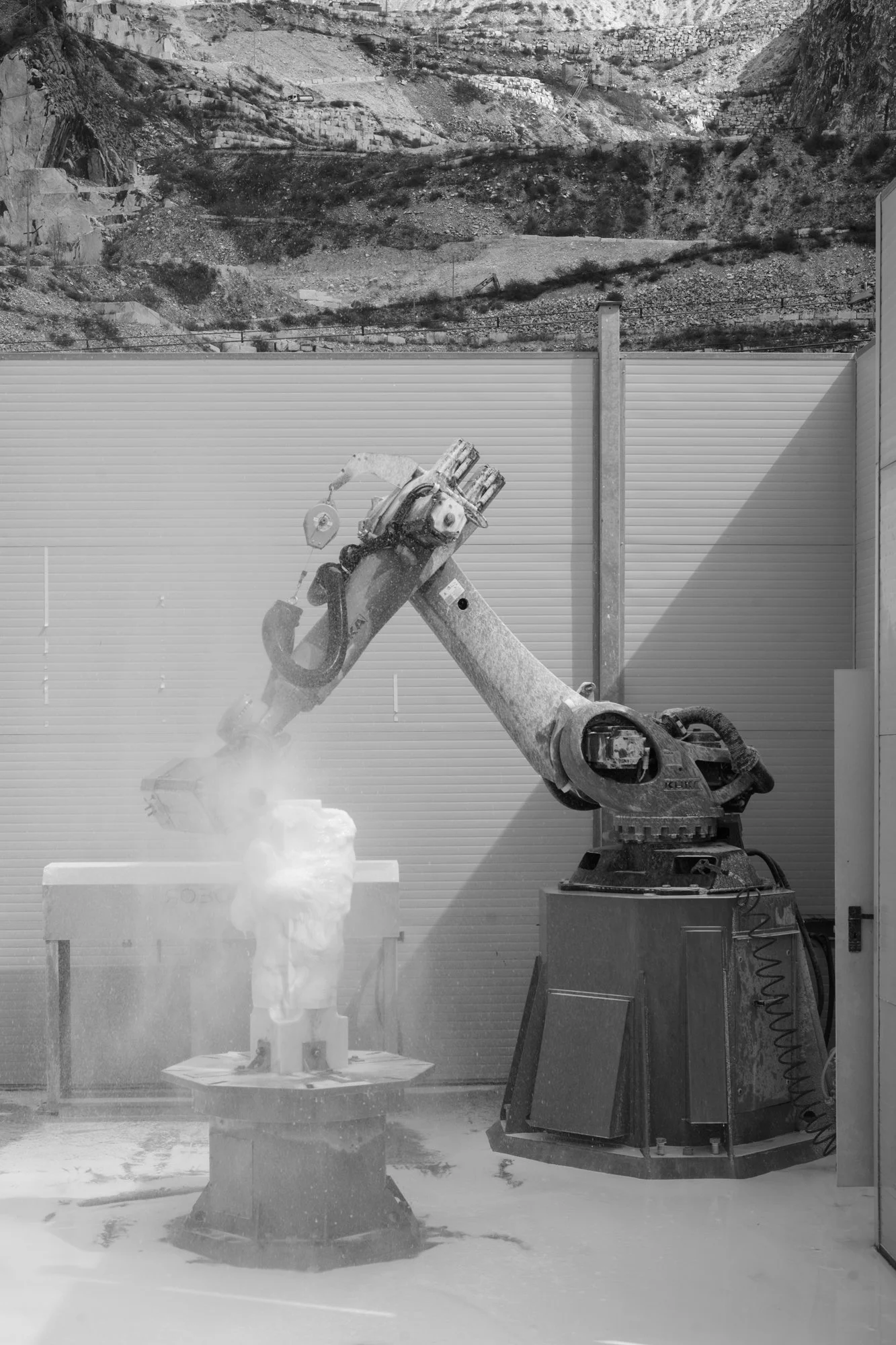 Further into the production of Artist Filippo Tincolini’s sculpture at Robotor, with view of Carrara Mountain behind the working station. View 1 of 6. 2023. Caleb Stein.jpg