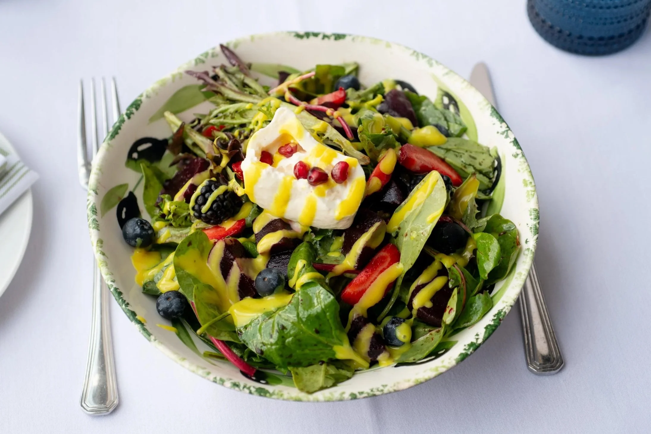  Greek salad with Burrata and pomegranate seeds 