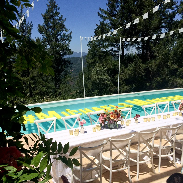 Custom Papel Picado Banners & Pool Installation Created for Michaels Makers Summit Alison Events Photo from Delia Creates