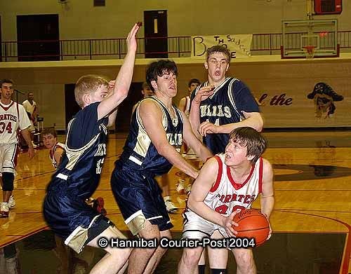 I couldn't dig up any pictures of Patrick playing hoops in high school, so here's proof of my Chips Ahoy-addled high school body trying to play basketball. Why didn't my parents tell me to get my haircut?
