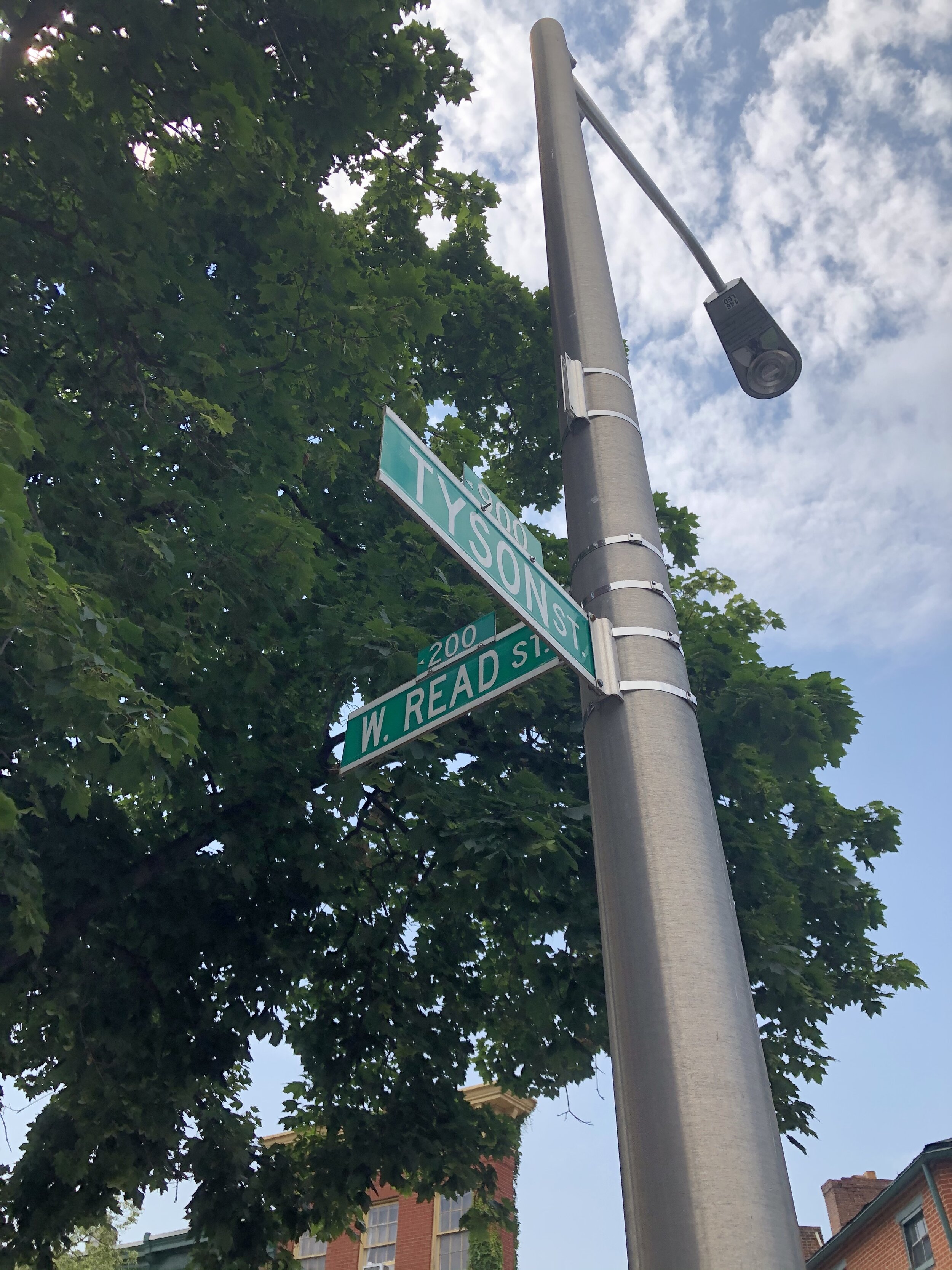 Space Between Counseling Services and Consulting therapy office street sign