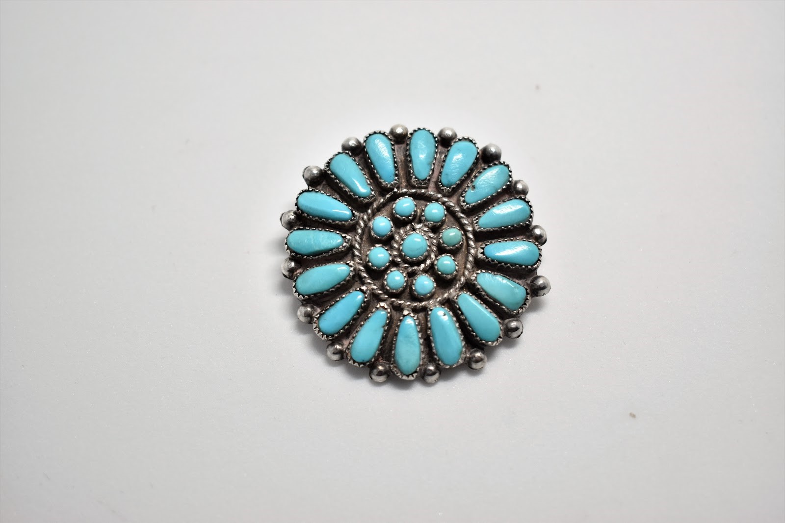 zuni sunburst peptit point.jpg