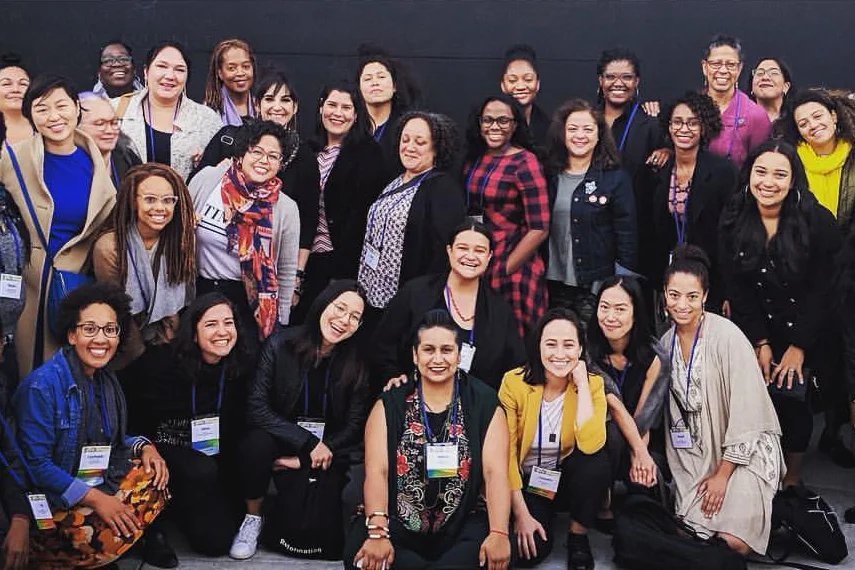 Kristin Sakoda (pictured center left) at a WOCA conference in Oakland, California.