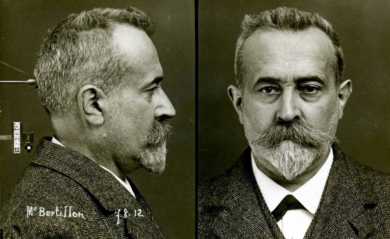 Alphonse Bertillon self portrait in the standardized mugshot template he developed in 1888.