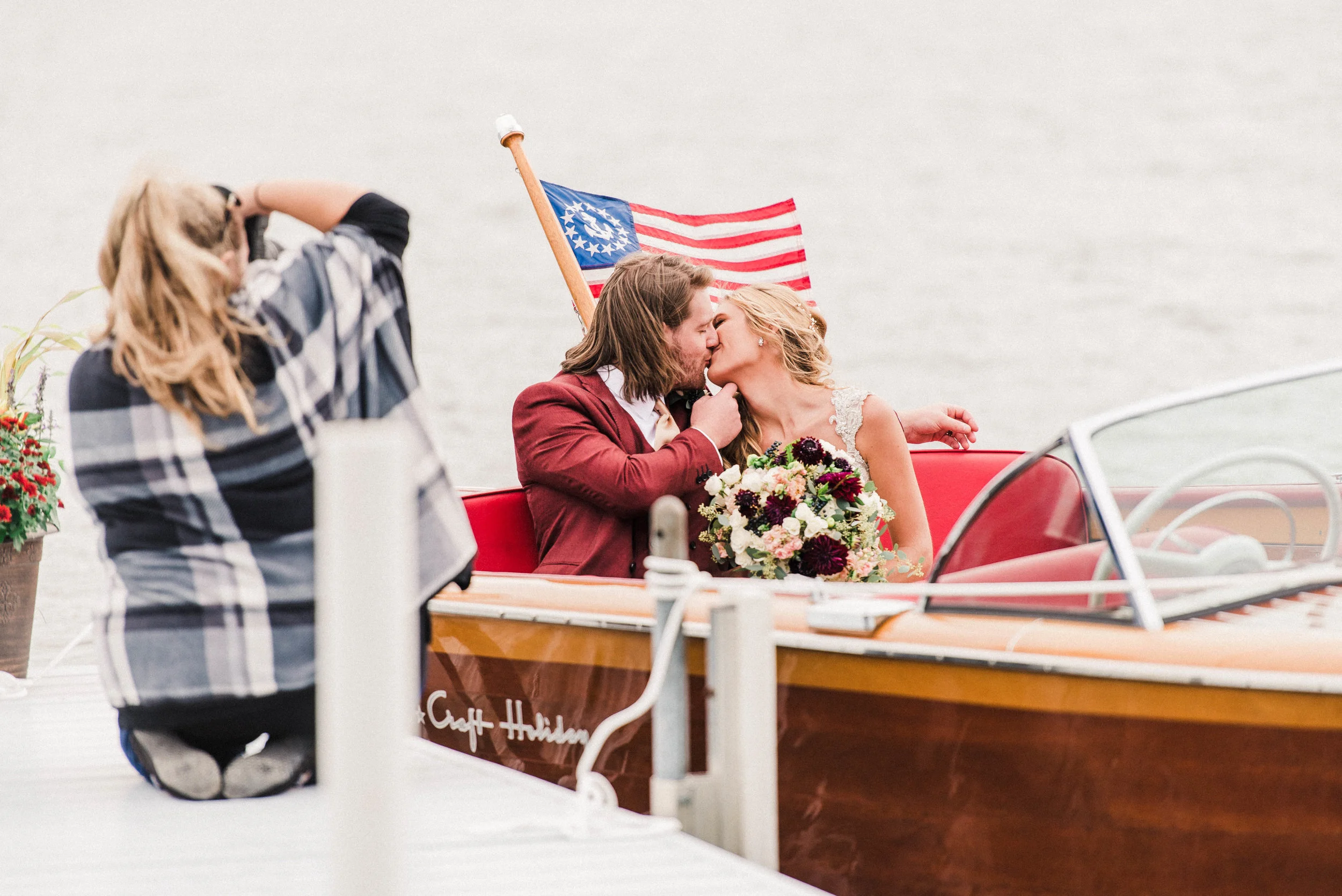 Kat photographing this adorable bride and groom in a custom boat that gave us all the Mamma Mia: Here We Go Again vibes!