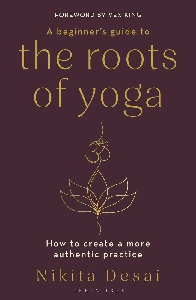 Image of The Roots of Yoga bookcover. It is a purple bookcover with gold writing.