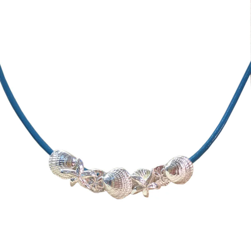 small seashell collage on light blue cord.jpg