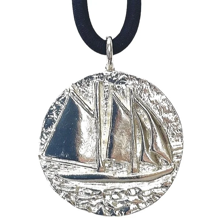 sterling%2Bsilver%2Bschooer%2Bon%2Bnavy%2Bleather%2Bcord.jpg