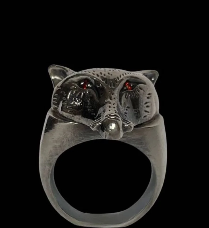 Oxidized fox ring with garnets.jpeg