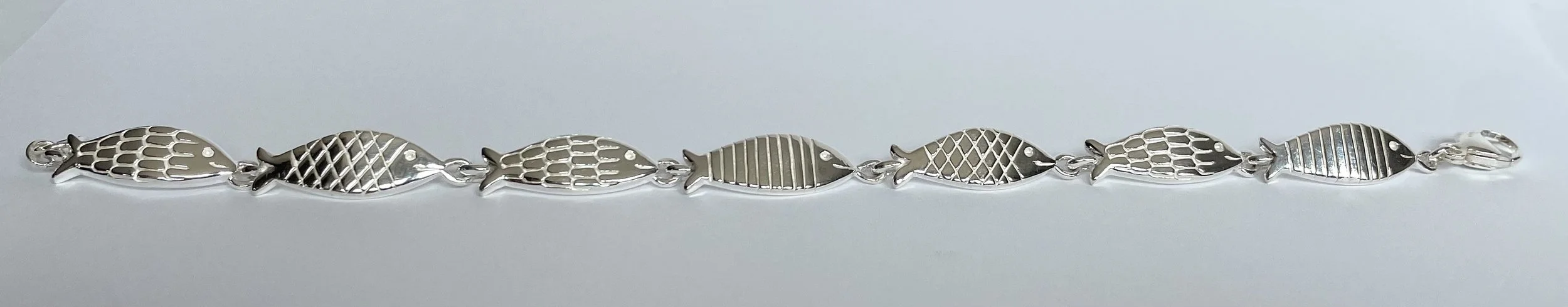 Betsy Frost Design Swimming Fish BraceletIMG_9798.jpeg