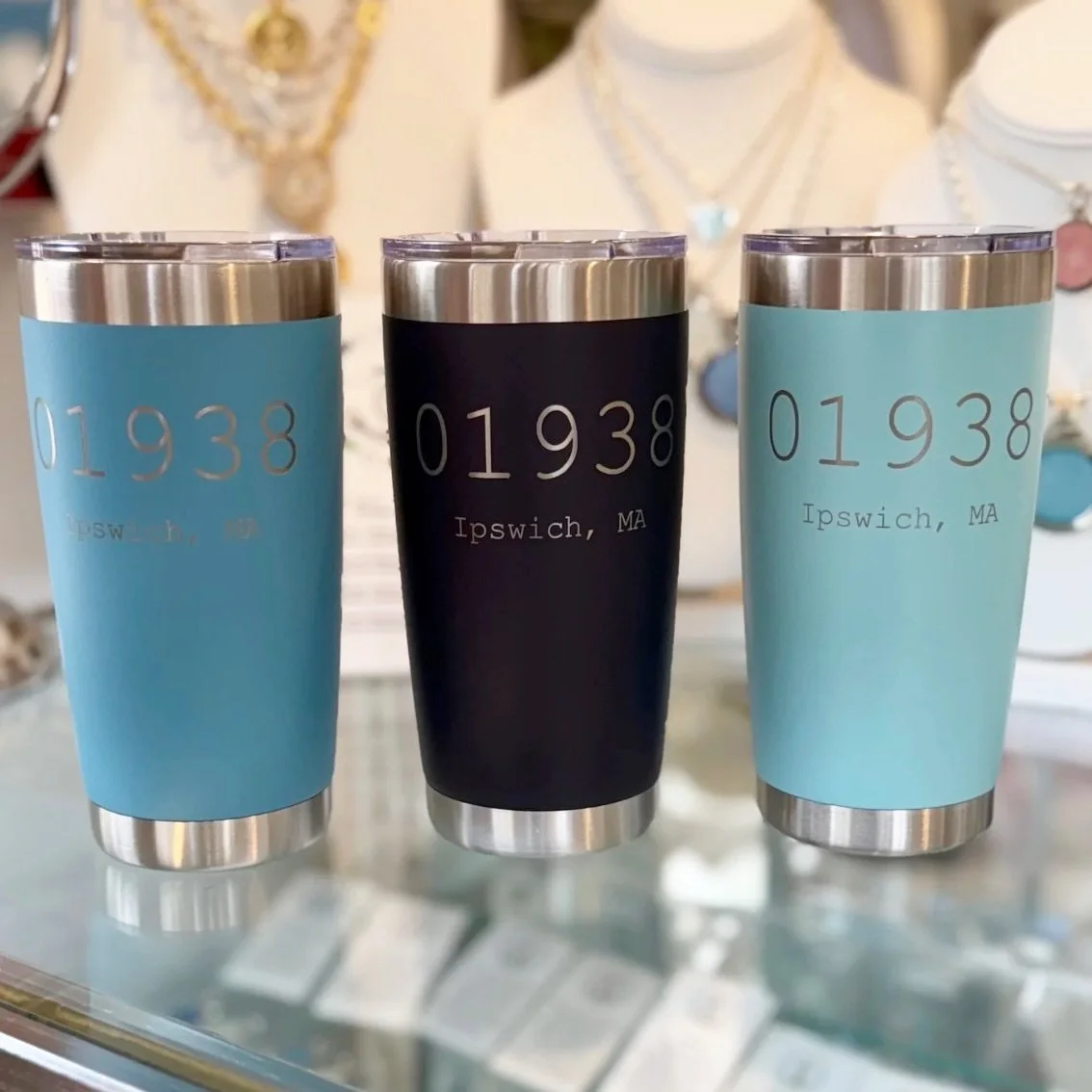 The Ipswich Zip Code 20 oz. Tumblers are now back in stock! Sip in Local Style and  show off your hometown pride with our 20 oz. stainless steel tumbler, featuring the Ipswich, MA zip code in a sleek design. 

Perfect for hot coffee or iced drinks, t