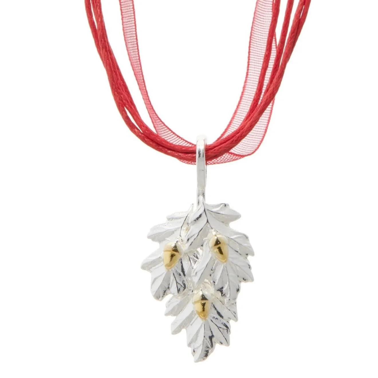 Our Holiday Swag Pendant is perfect for the Christmas Season! Need subtle bling for the holidays?  The swag measures 1.75&rdquo; long and .75&rdquo; and comes in a variety of options of color.  This pendant is Solid Sterling Silver with 14K Gold over