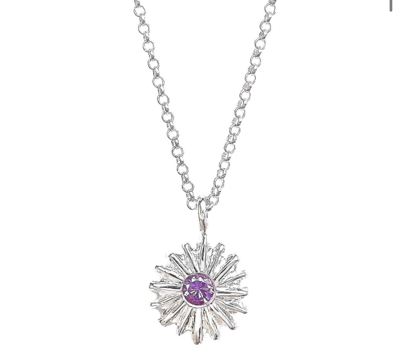Bring in the New Year with some sparkle! ✨ The Castle Hill Sun Sparkle Pendant! Choose your favorite color/stone: 
Ruby CZ
Blue CZ
Genuine Amethyst
Clear CZ
Pink CZ
Genuine Peridot
This pendant was made from the very center of the Castle Hill Sunburs