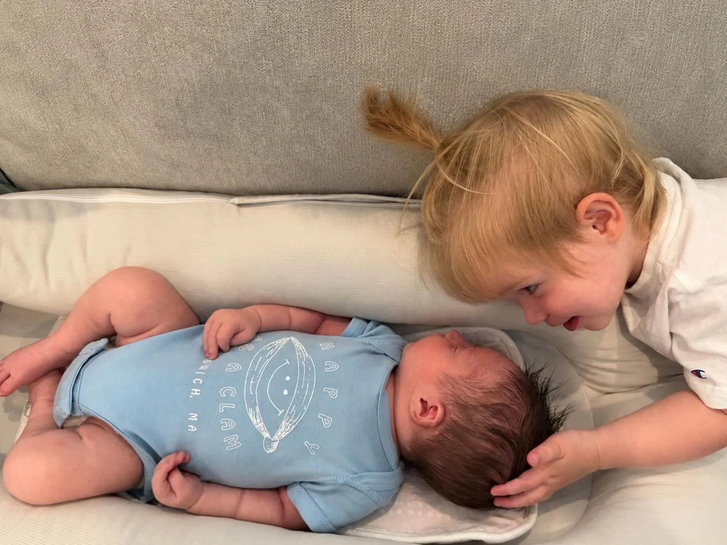 We sure are &ldquo;happy as a clam&rdquo; to see this adorable baby modeling our onesies (with the sweetest sibling looking on) See our cutest baby onesies at the shop!
