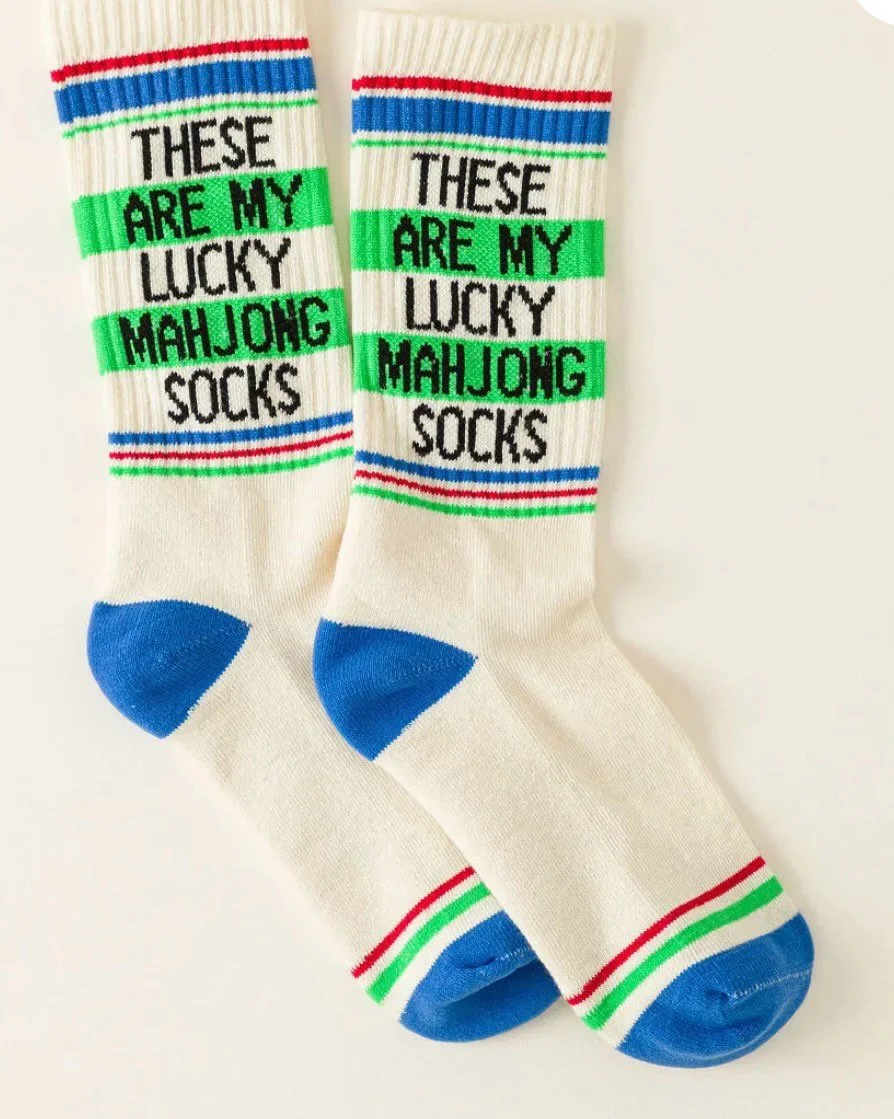 These will knock your socks off! 🧦 Perfect gift for the Mahjong lover or book lover! By @gumballpoodle Now at the shop. Open Sunday 11:30-3:30.
