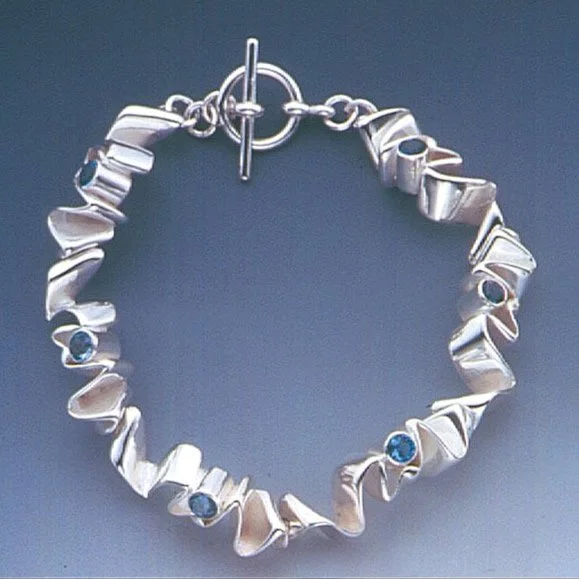 Sterling Silver Ribbon Candy Bracelet with Blue Topaz