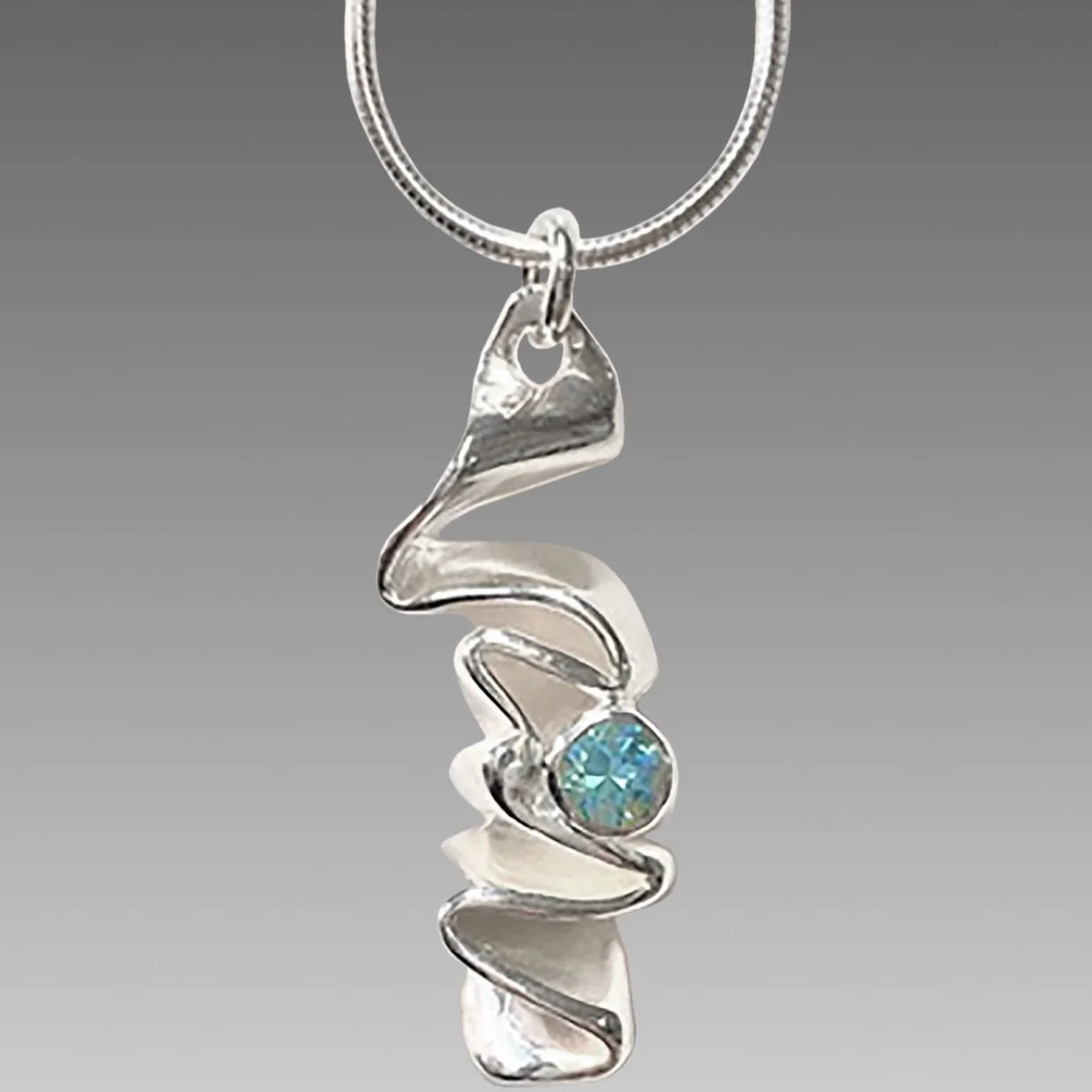 Sterling Silver Ribbon Candy Pendant with Aquamarine CZ