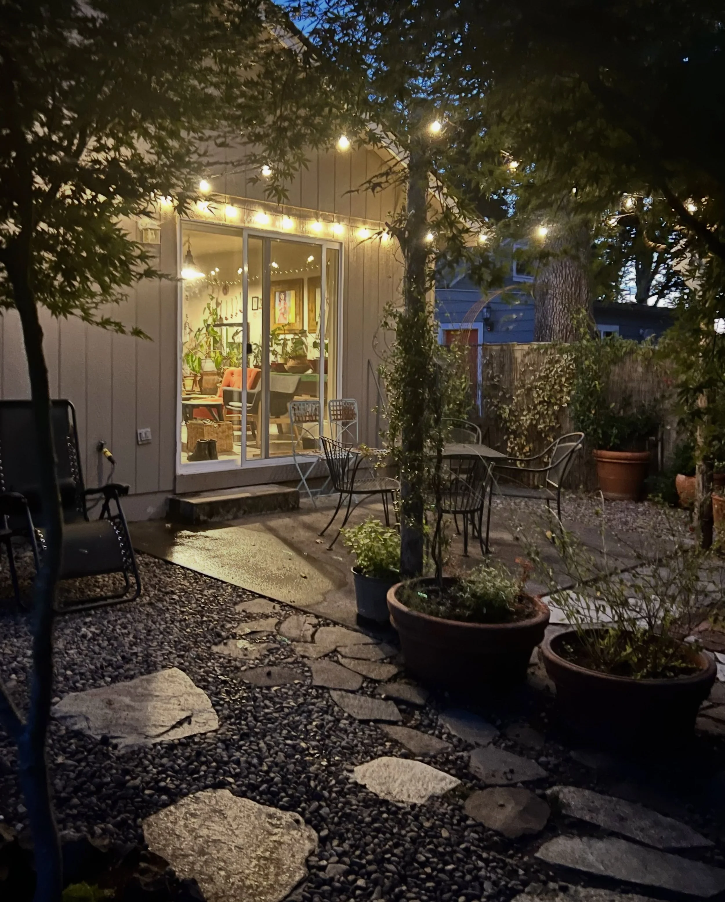 In the night a glass door is still a door. A way. 

Transparent and reflective, she keeps track of a leaving and a reentering. 

Of a coy inside and what is &lsquo;out there&rsquo; to grow.