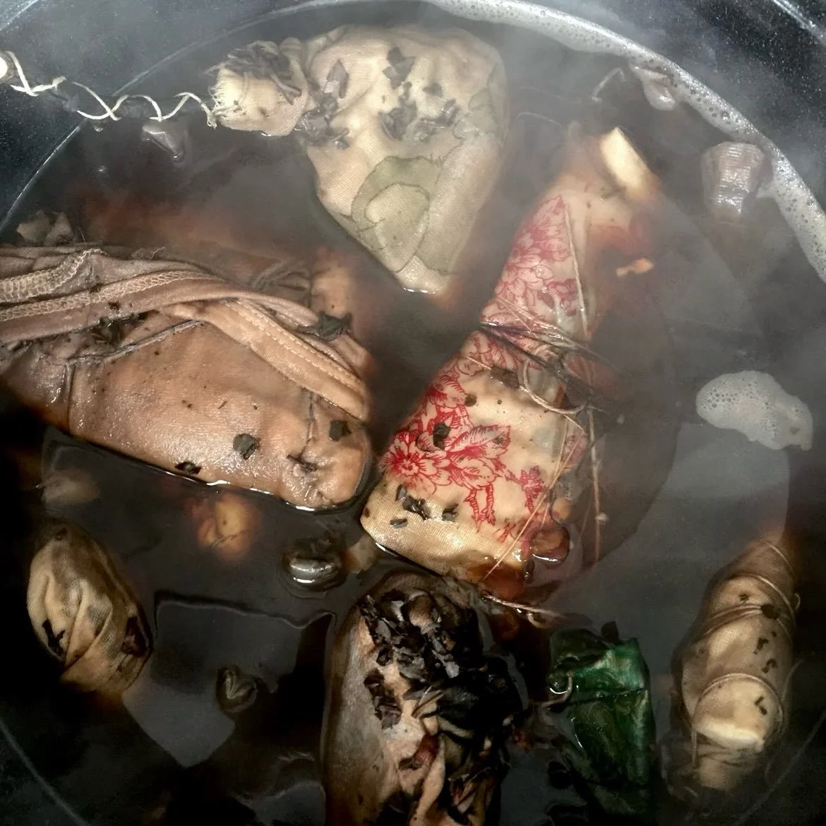 Paper, rust, cloth, thread. Hibiscus, and Turmeric. 
Bubbling water, black tea, burning flame. Polaroids, sepia photographs, of strangers, of those we got to know way too well. Way too rushed. Too slow. Way too late. Bundled. All tied up, touching, s