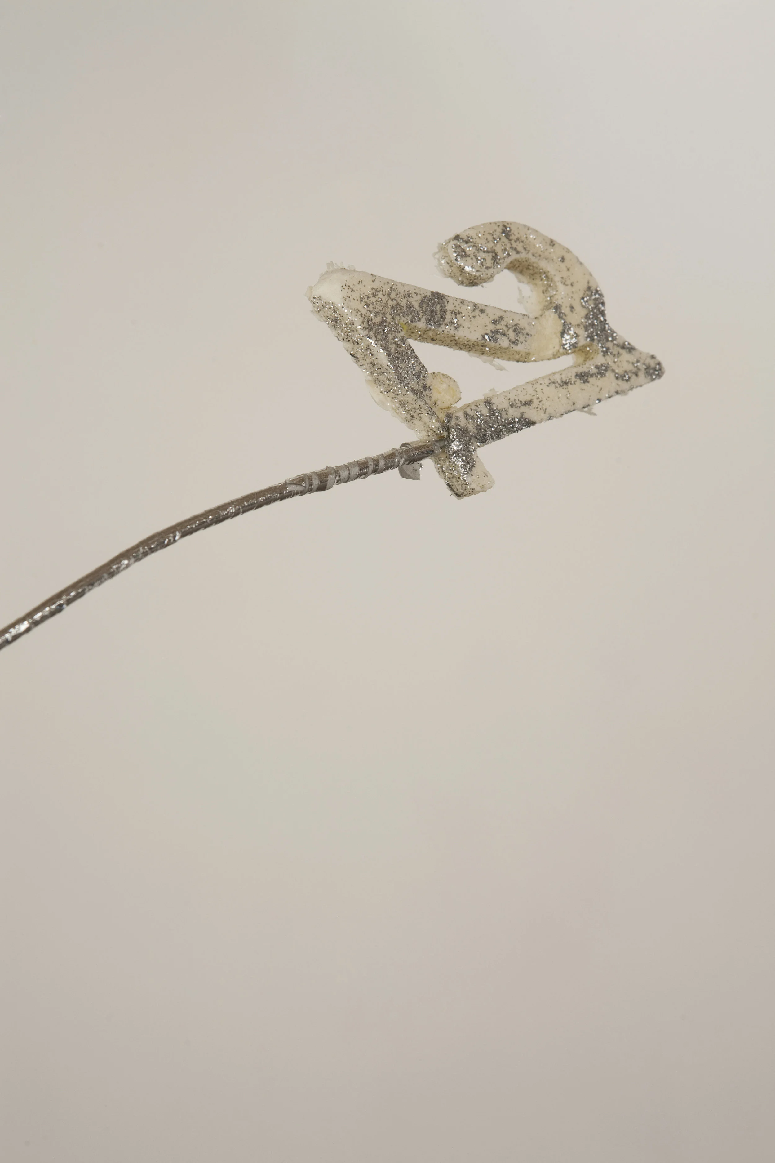 Forever 21 (I) , 2011, modified balloon weight, polyurethane expanding foam, custom DAR pine plinth, silver leaf, detail, M.O.M. (Muse of Manila) , 2011, Firstdraft, Sydney. Photo: Charles Dennington. Copyright JD Reforma