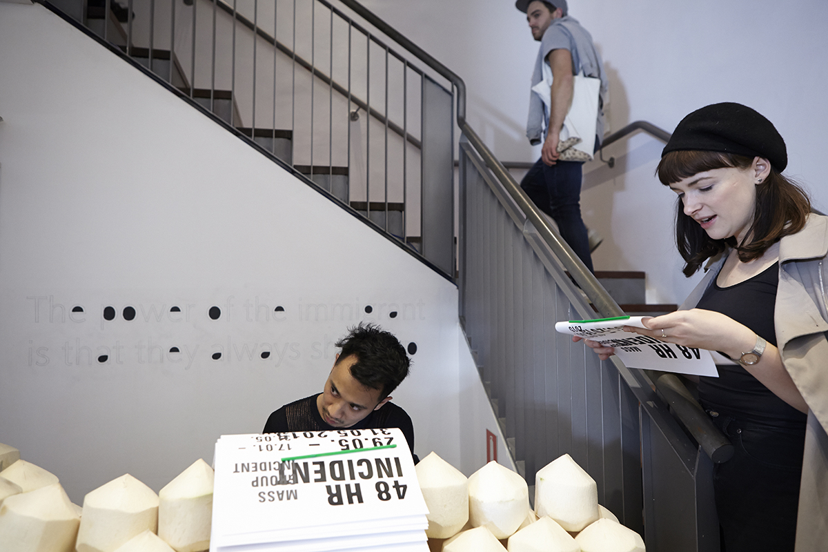 A Novel Merchant (performance documentation), 2015, performed as part of 48 HR Incident , 4A Centre for Contemporary Asian Art. Photo: Zan Wimberley. Copyright JD Reforma.