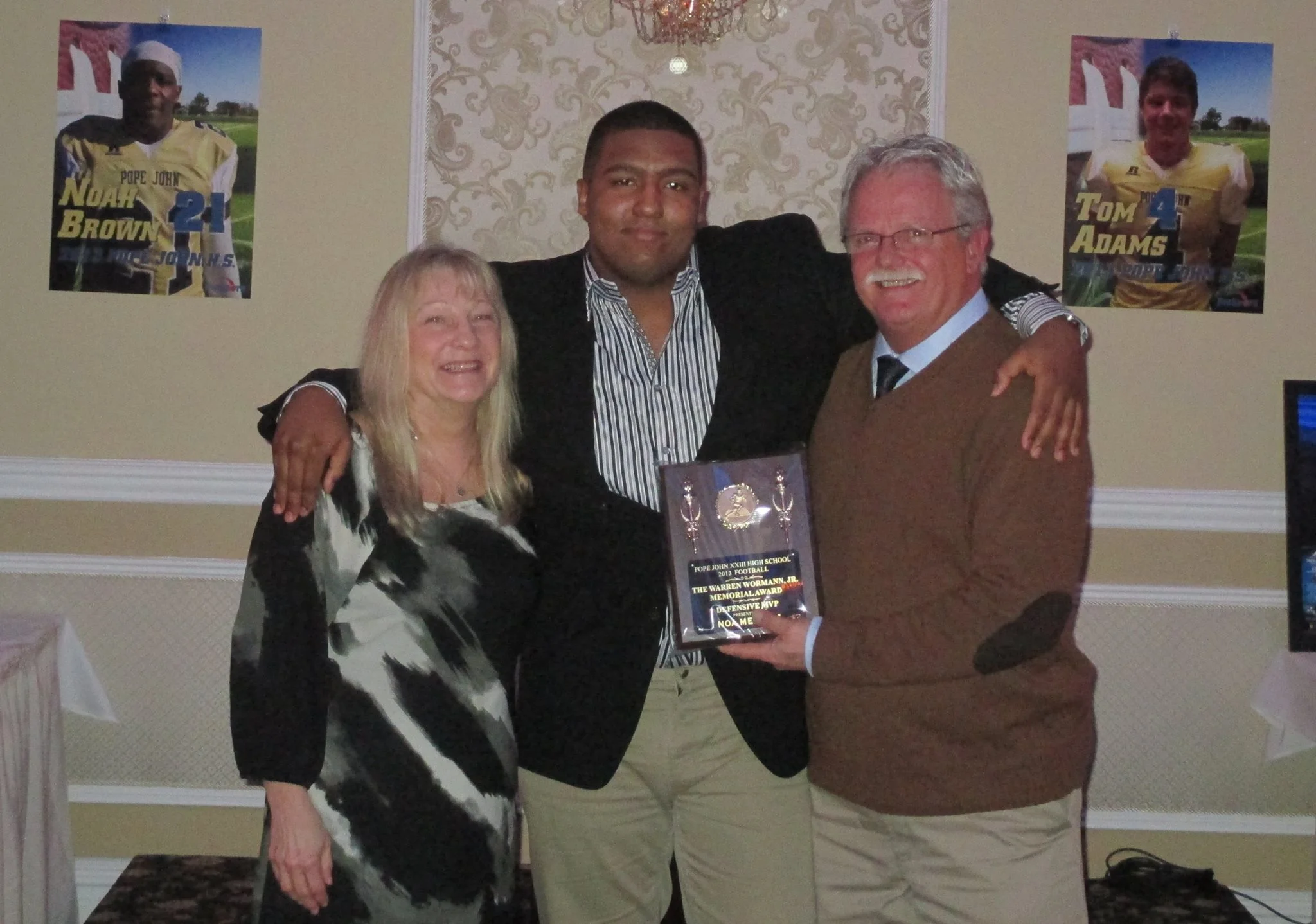 Presenting the 2014 Defensive MVP Award to Noa Merritt
