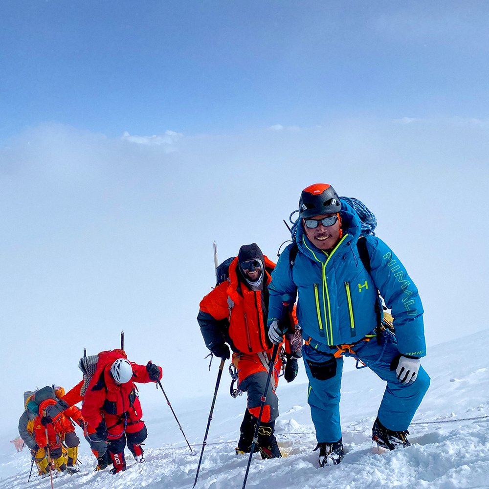HIMALI Unisex 8000m Downsuit ANTIFreeze Tendi with mountain climbers.jpg