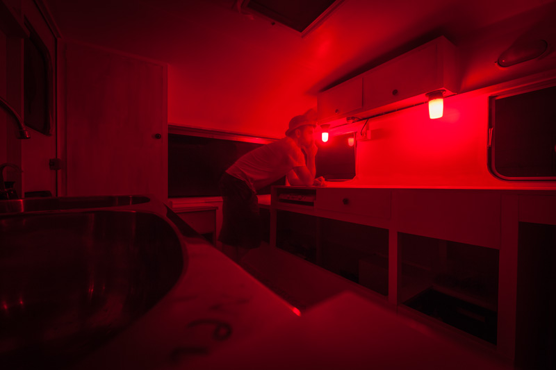 Caravan under 240V red lights