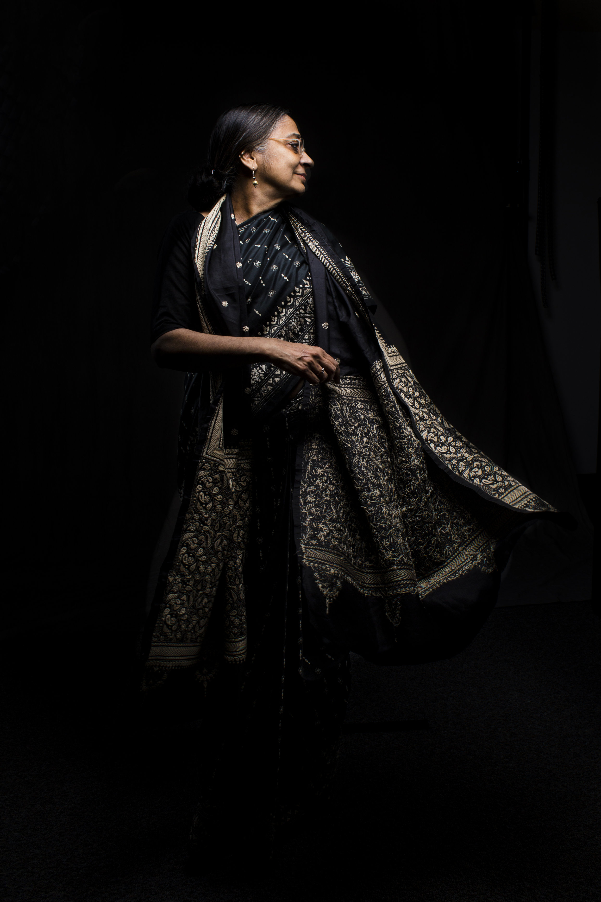 Associate Professor of English Modhumita Roy is shown here in her mother’s sari and sash, which she wears on Commencement Day. The embroidery pattern is specific to where she grew up in Kolkata, the c