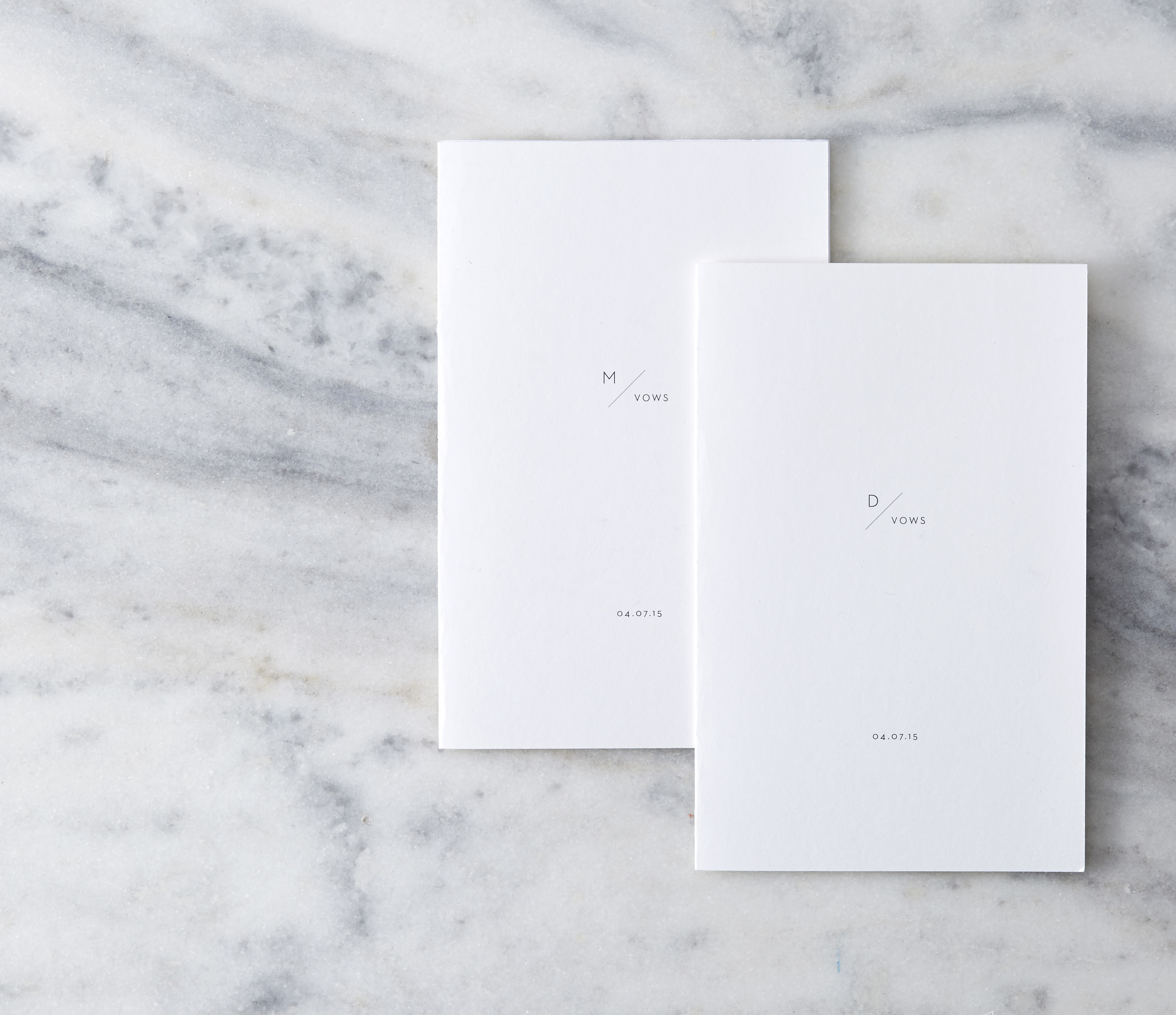 His and hers keepsake vow book covers.