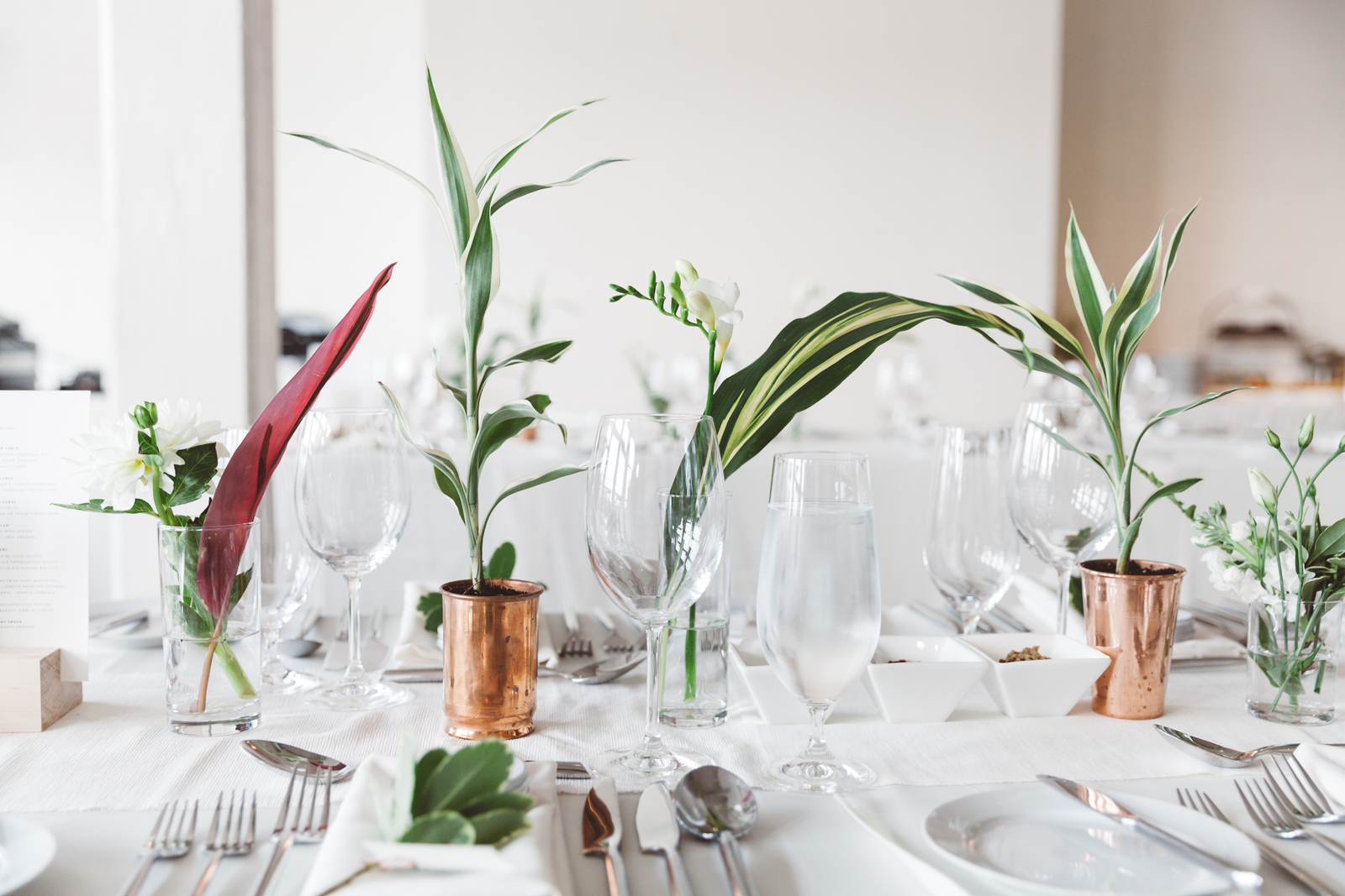 A clean and modern palette that incorporated elements of glass, copper and layered white textures, punctuated with fresh greens.