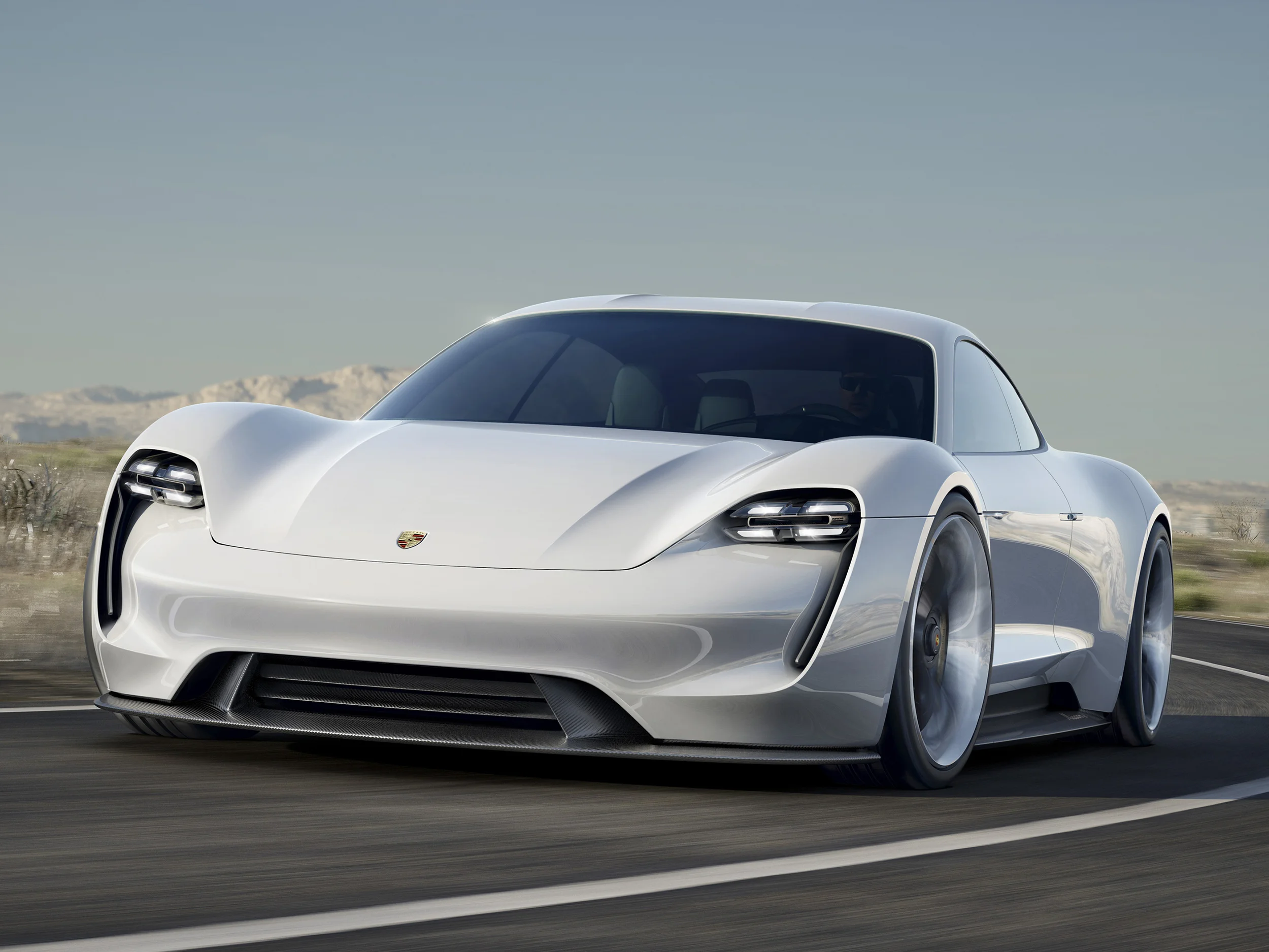 Porsche unveils new Mission E concept