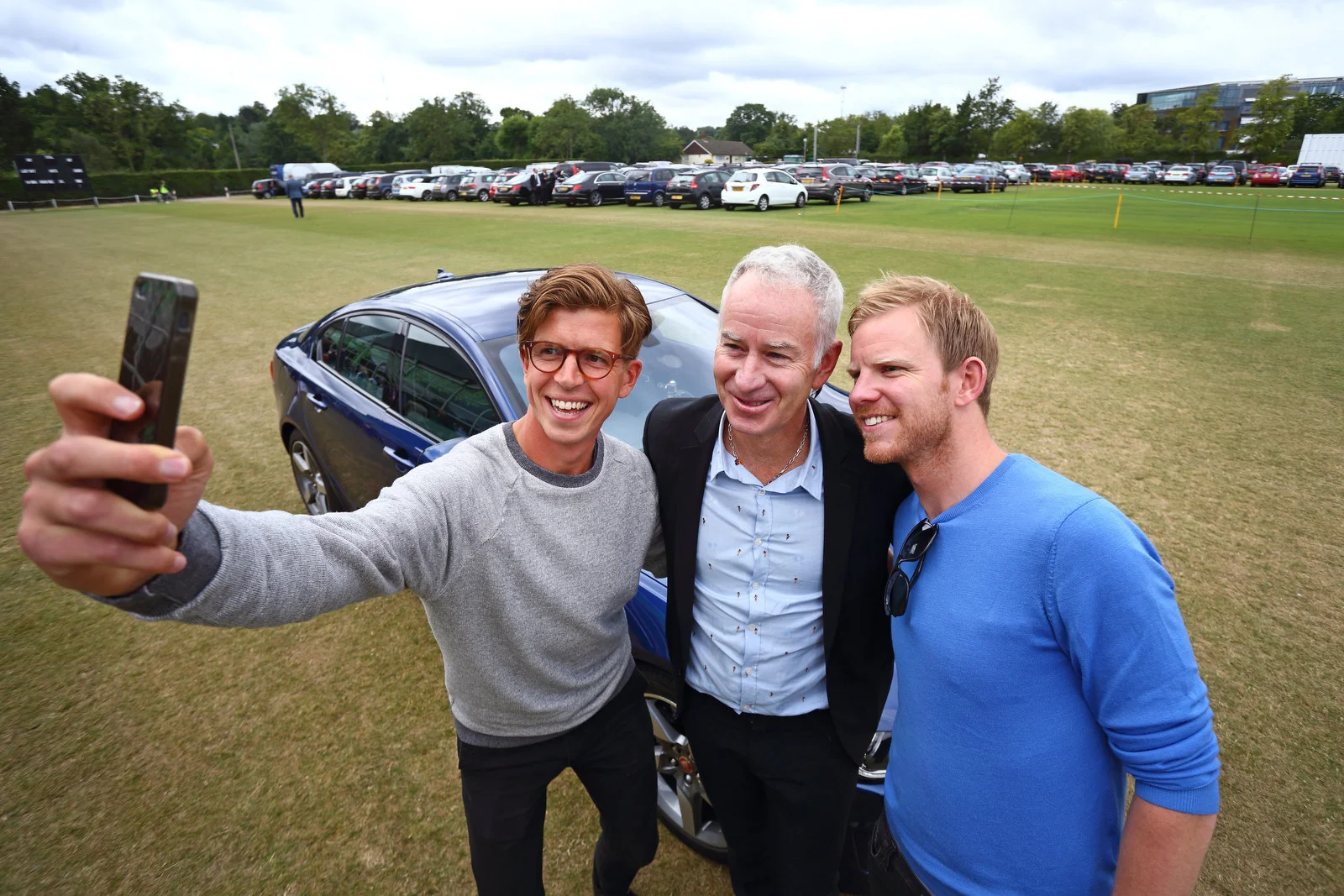 John McEnroe Chauffeurs Wimbledon fans in Jaguar XE
