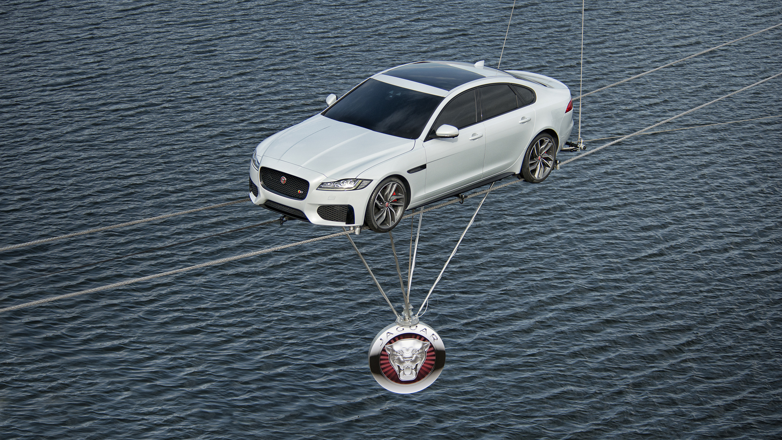 VIDEO: All-new Jaguar XF suspended over the Thames