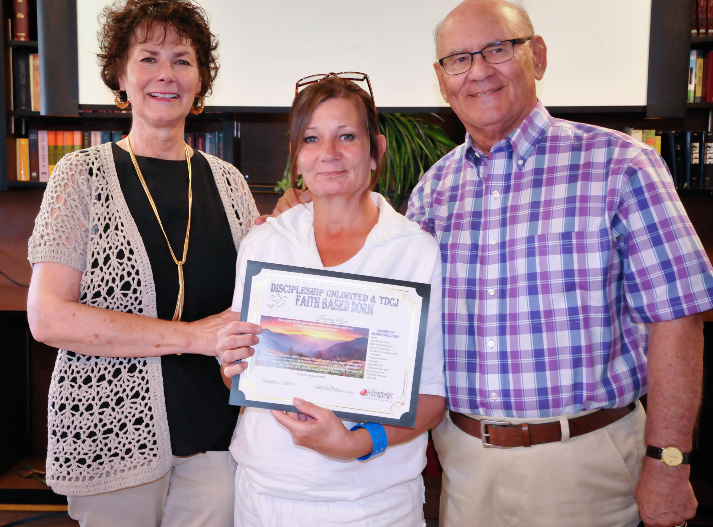 Hilltop Trust graduate with Dennis and Ruth Ready