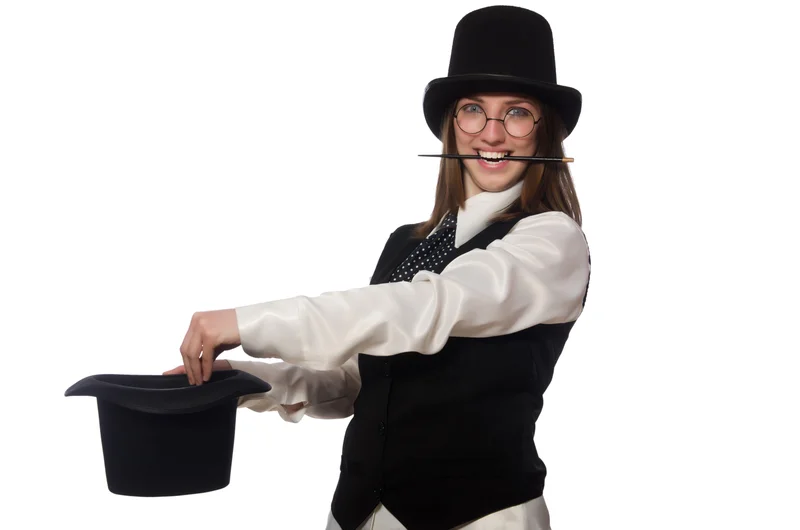 © Elnur | Dreamstime.com - The Woman Magician Isolated On The White Photo