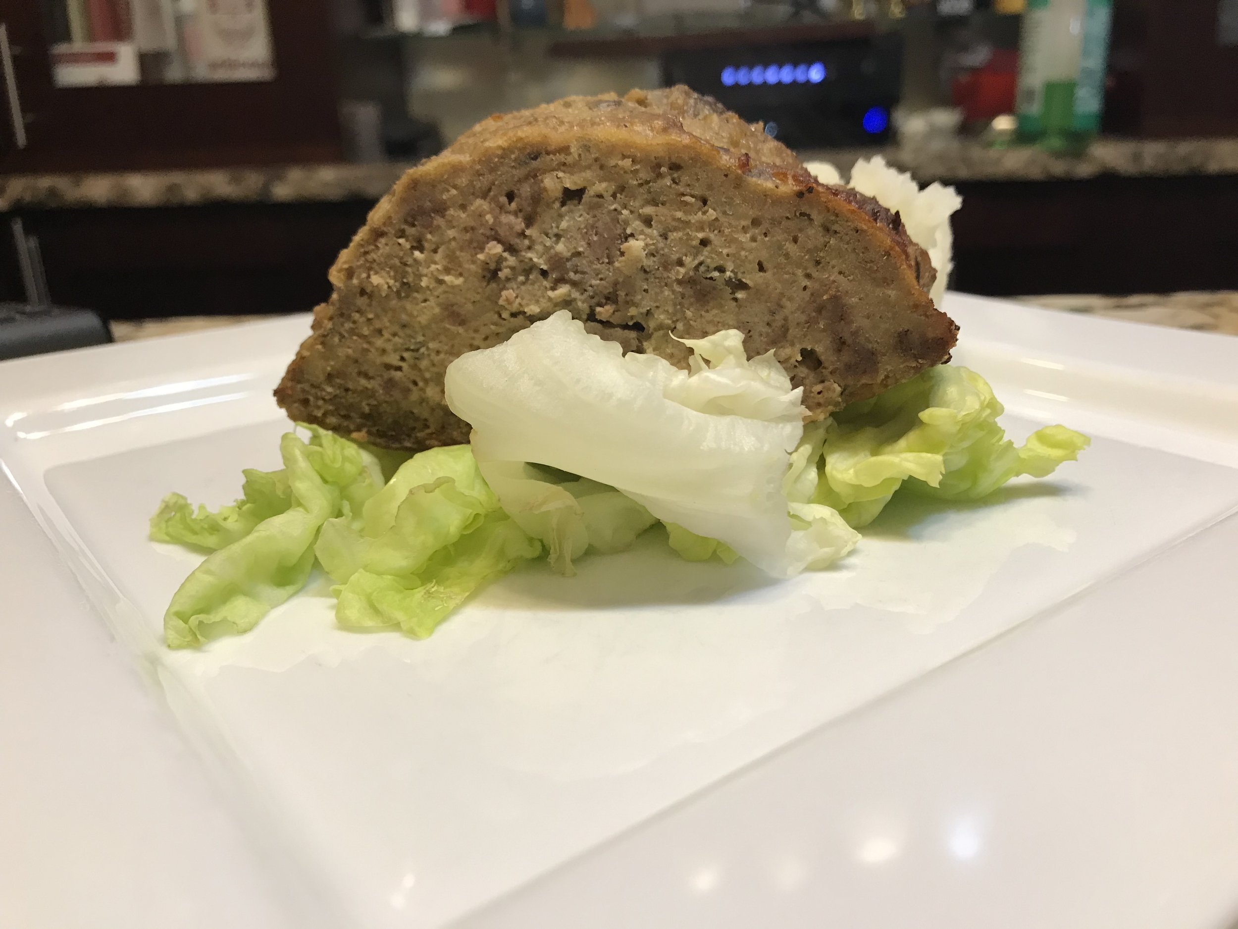 Festivus meatloaf, served on lettuce.