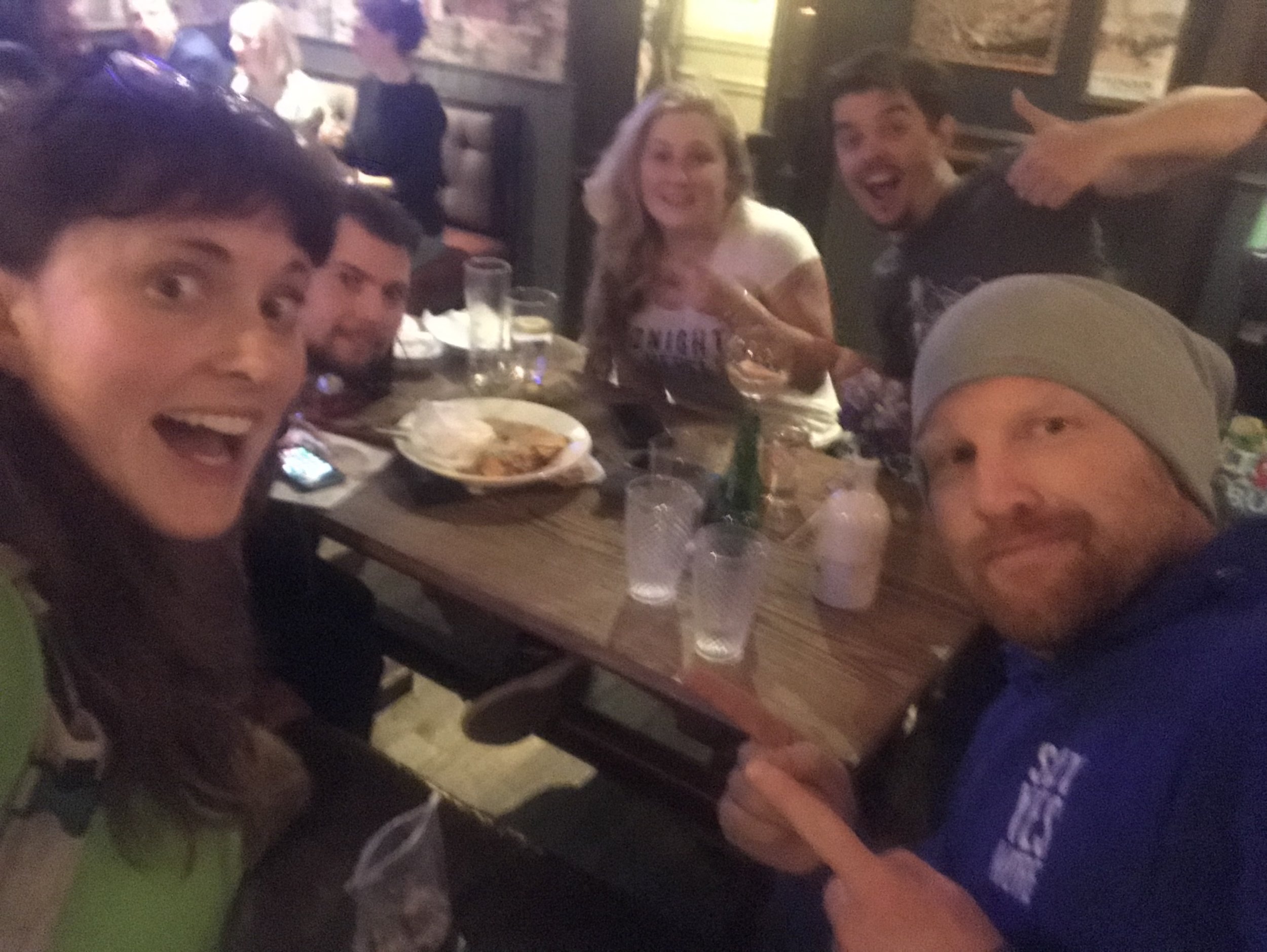 A very blurry selfie of SayYesMore YesTribe members Jen, Ian, Jenny, Tom and Dave in the pub before departure