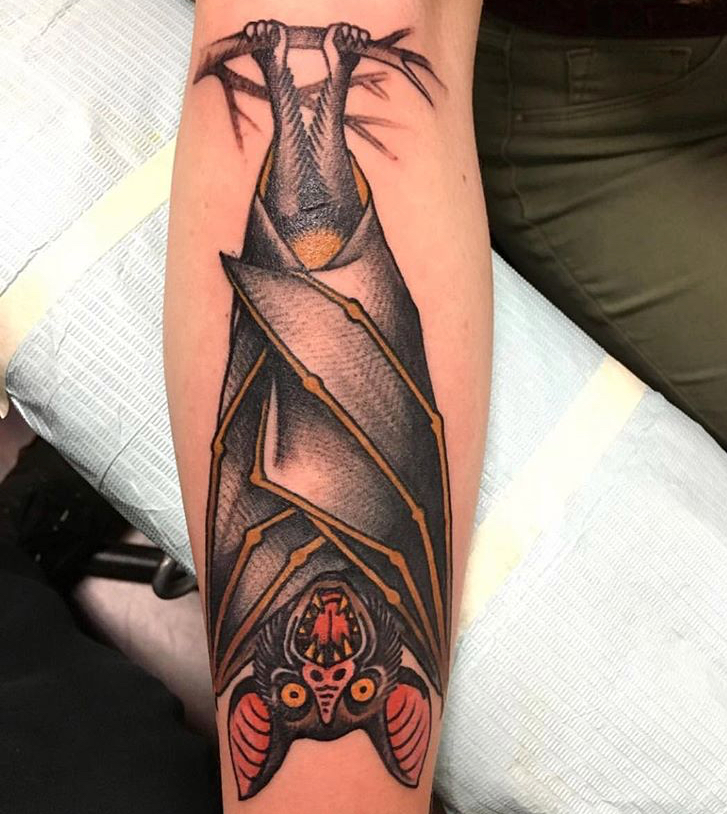 bat hanging upside down tattoo
