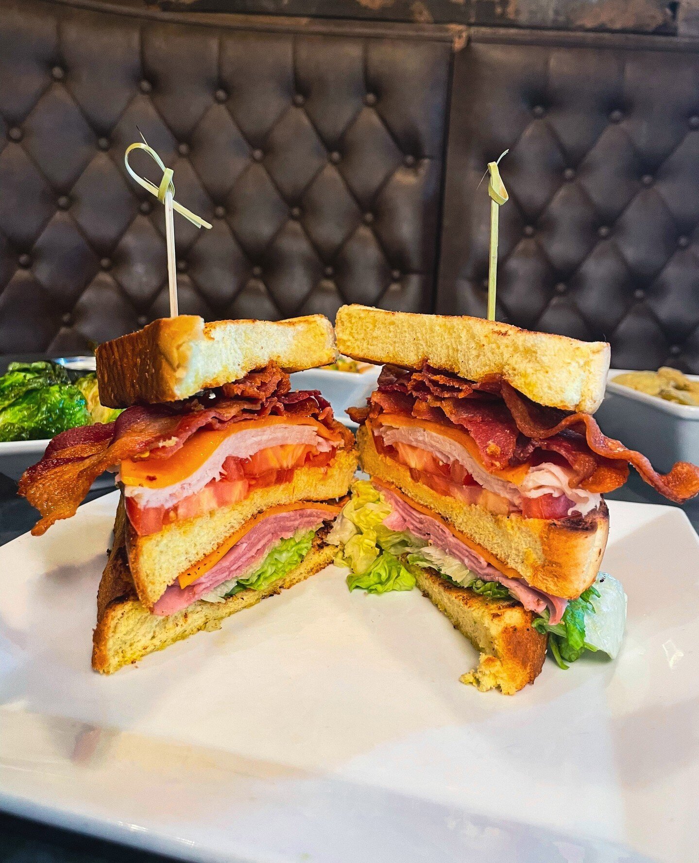 The next time you stop by for lunch, you've got to try The Texas Club! ⁠
This flavorful double-decker sandwich is stacked with country ham, turkey, bacon, cheddar, lettuce, and juicy tomato on toasted Texas bread.⁠
⁠
Grab a friend, sit back, and take