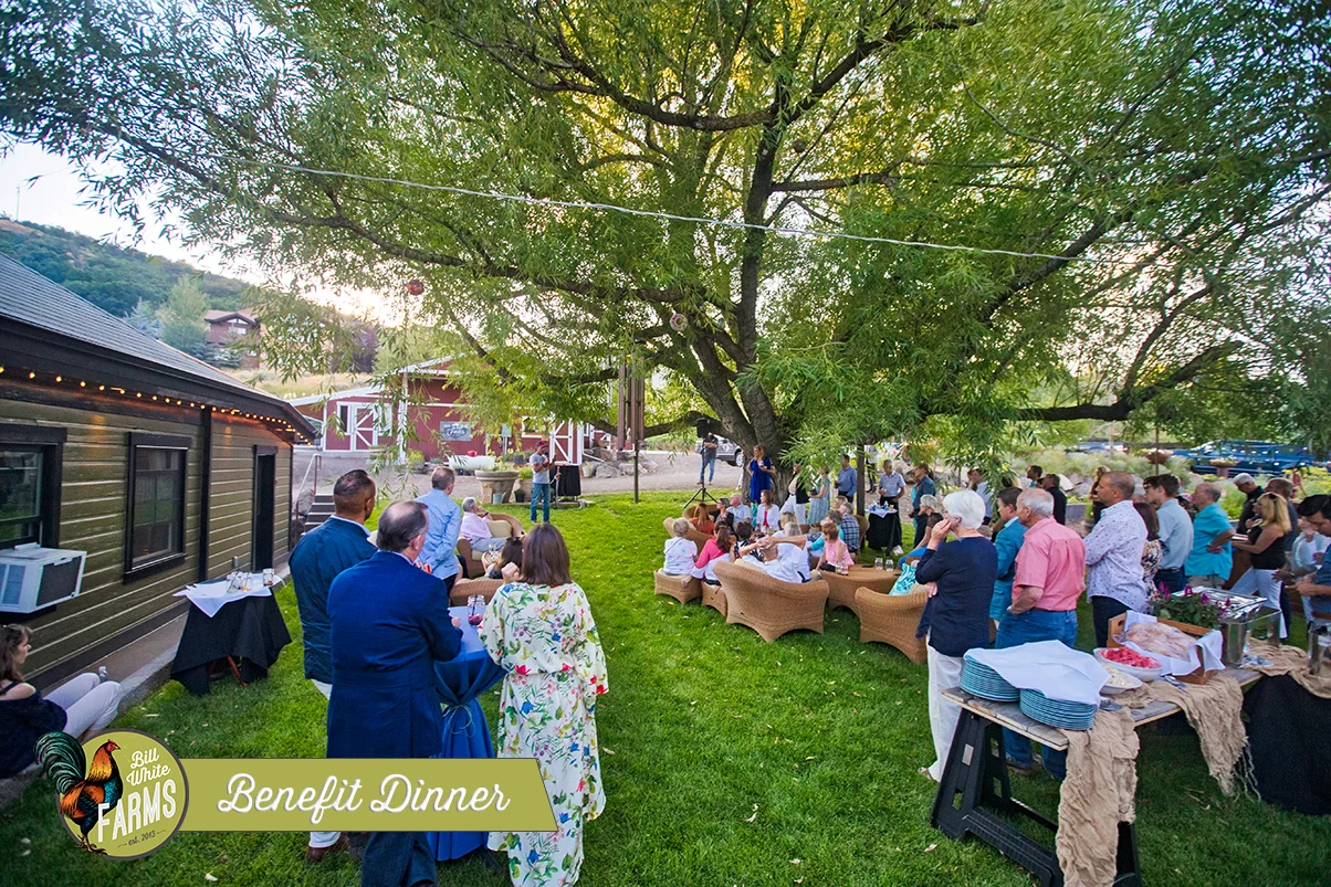 Bill White speaks about the farm to the Christian Center's guests.