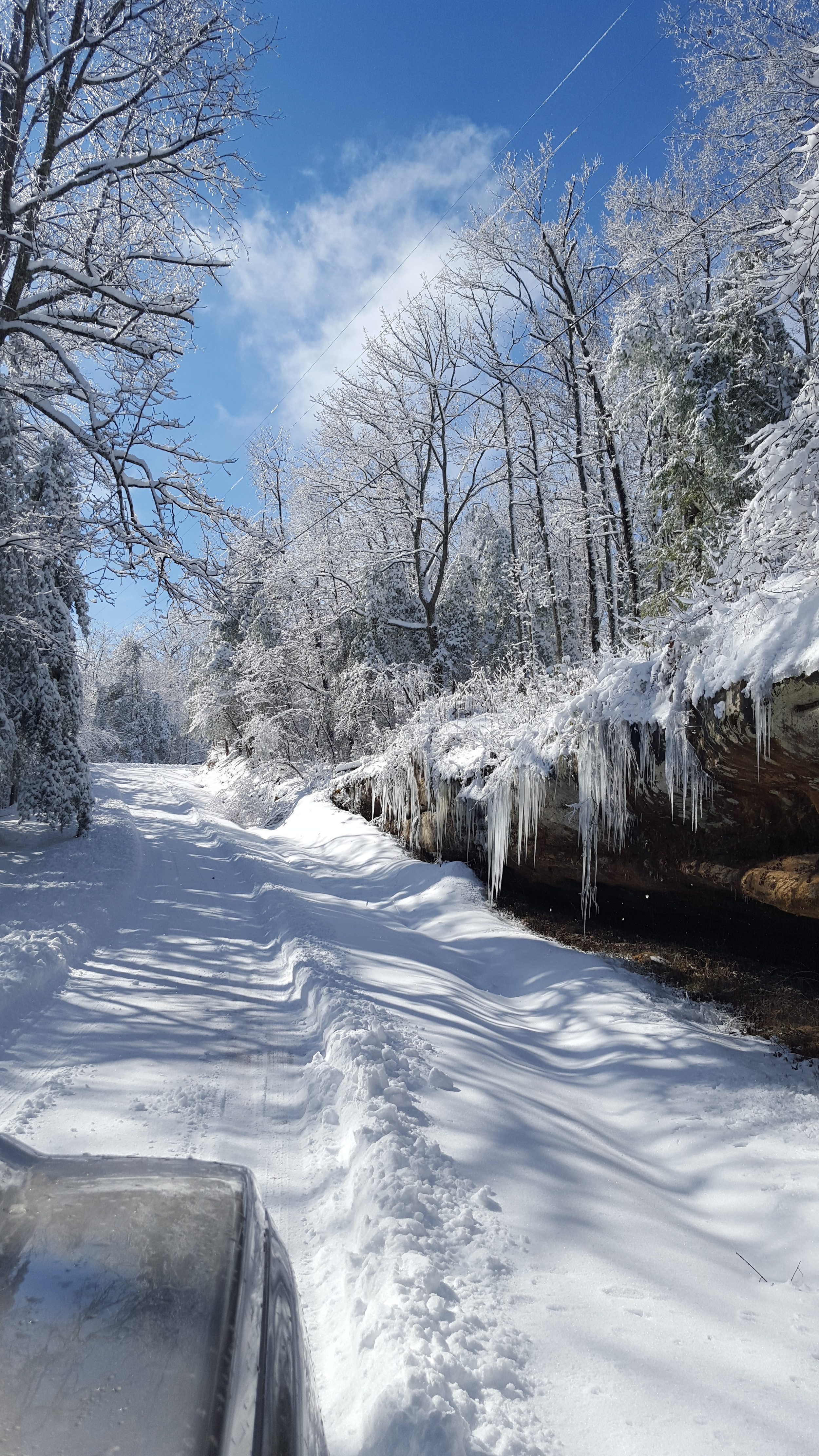 driving down a snowy road