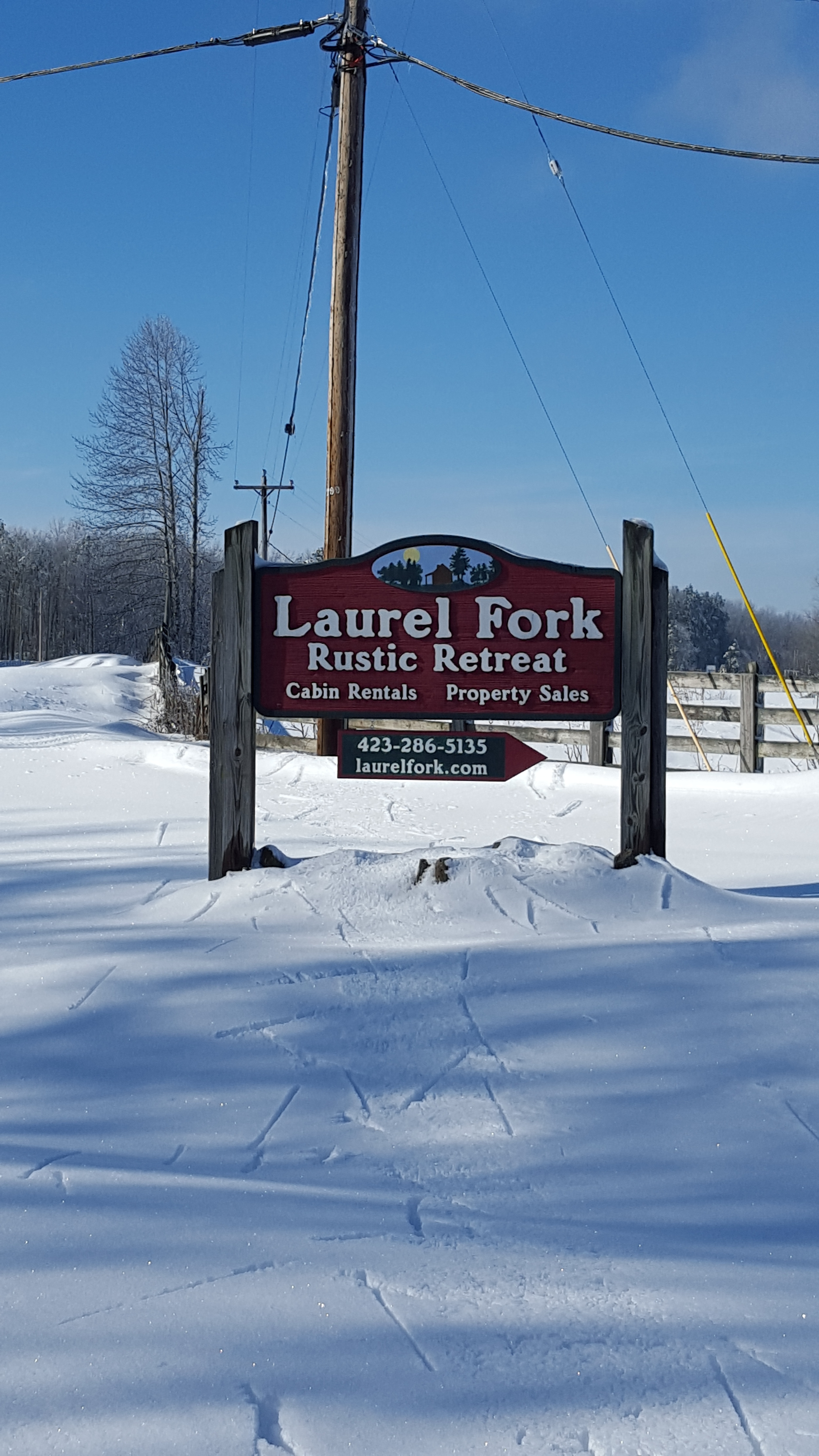 Snowy Laurel Fork Rustic Retreat sign